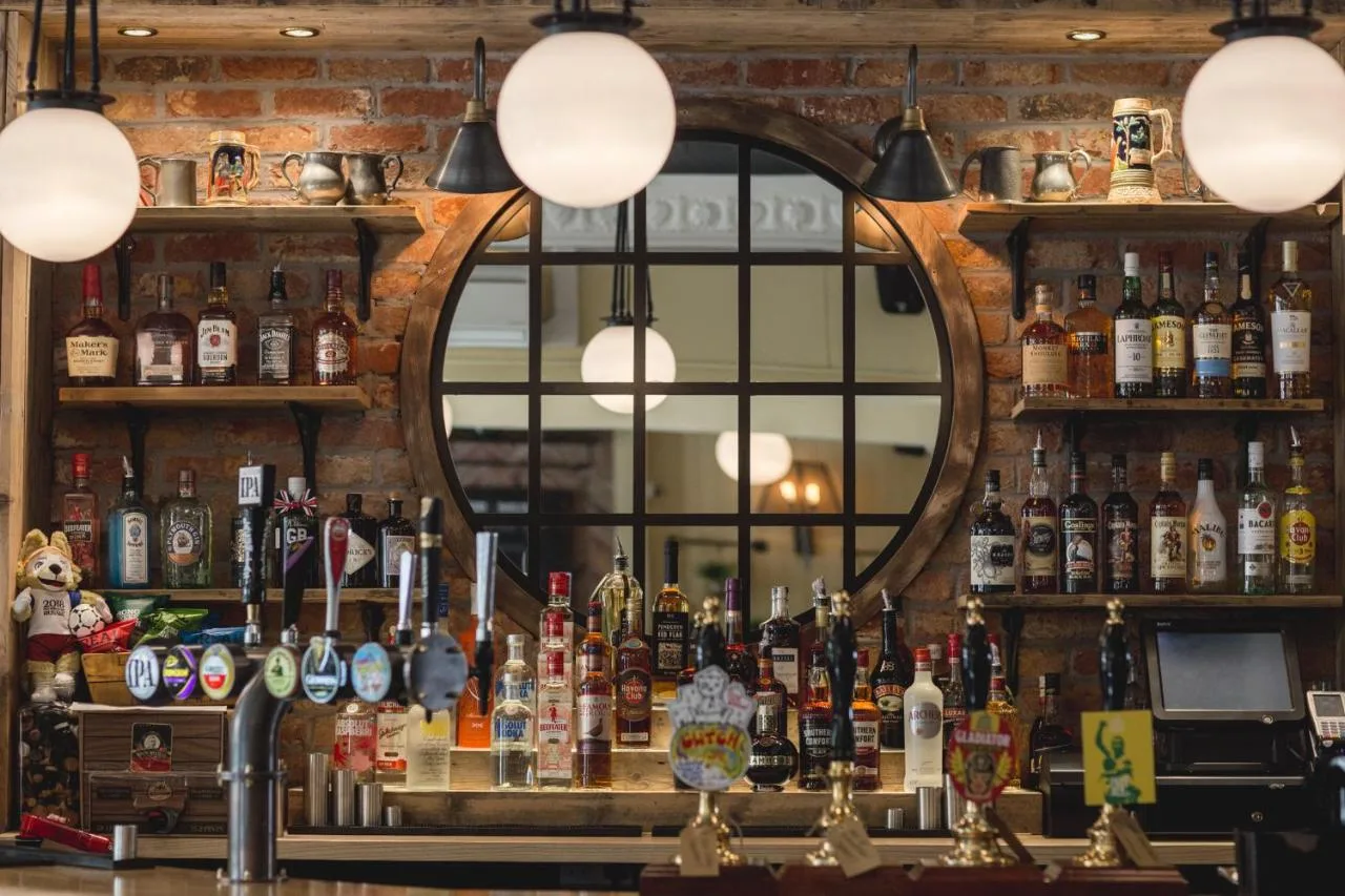 a bar with a mirror behind the bar at Pontcanna Inn in Cardiff